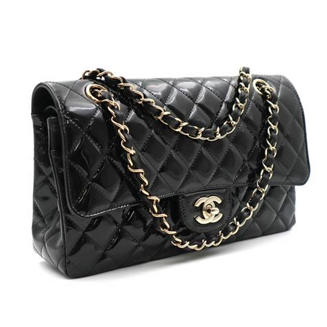 chanel black quilted pouch|Chanel black quilted flap bag.